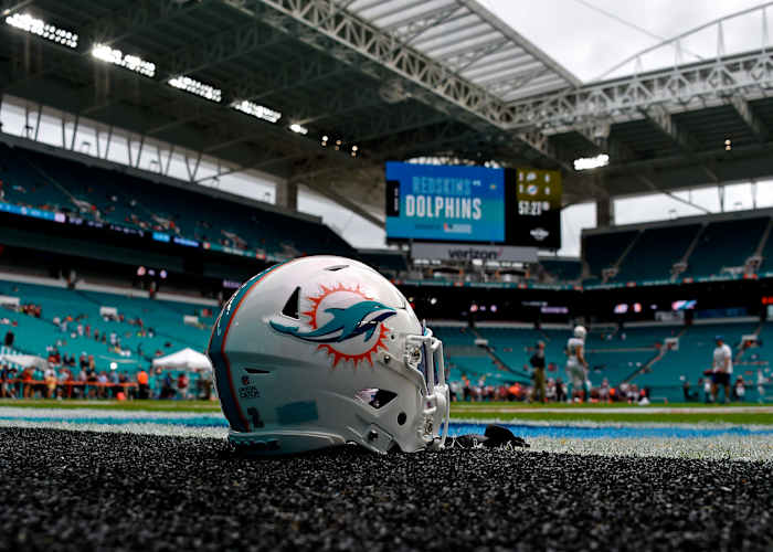 A Dolphins helmet is seen on the field before a 2019 game against Washington at Hard Rock Stadium.